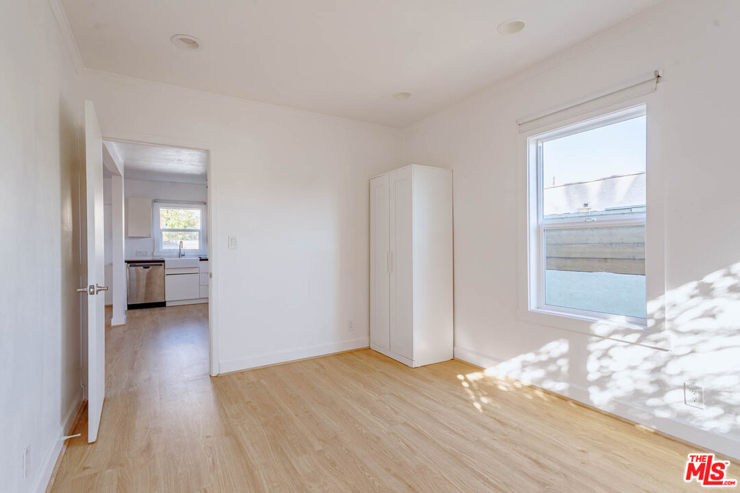 4309 Burns Avenue Los Angeles, CA 90029 - Photo 2 of 16 a view of livingroom with hardwood floor and bedroom view