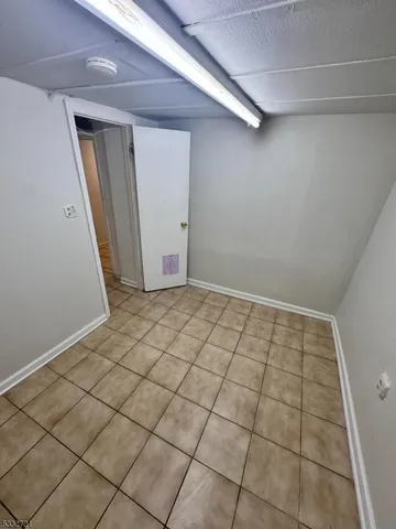 a view of a livingroom and window