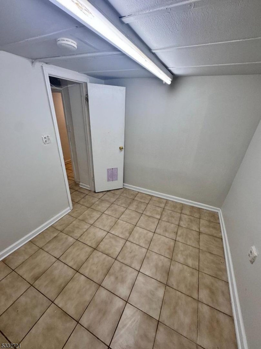 233 Jackson Avenue Hackensack, NJ 07601 - Photo 6 of 8 a view of an empty room