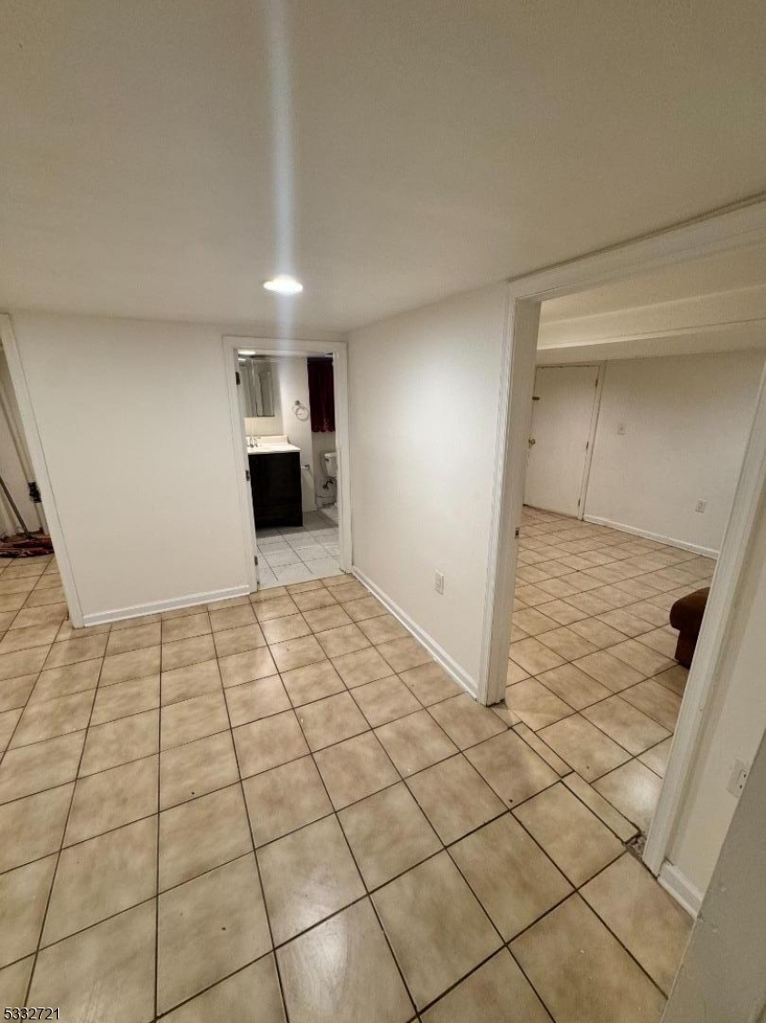 233 Jackson Avenue Hackensack, NJ 07601 - Photo 8 of 8 a view of a livingroom with a fireplace