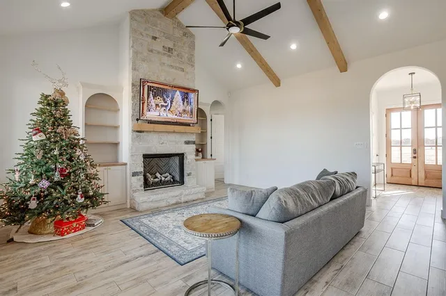 a living room with furniture and a rug