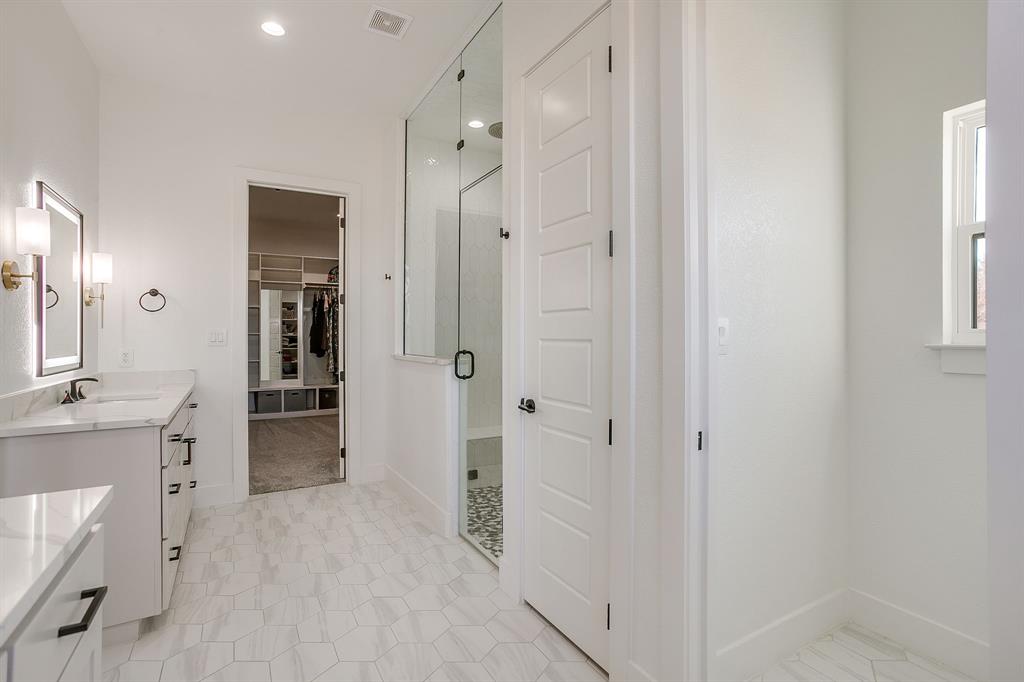 8140 Lavender Road Springtown, TX 76082 - Photo 24 of 40 a bathroom with a shower and a sink