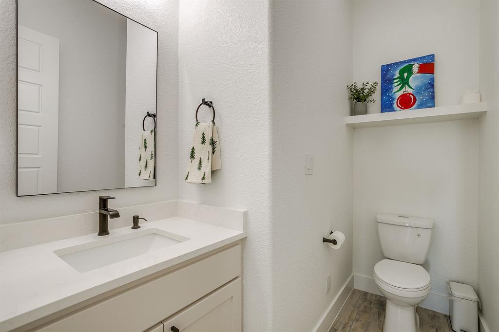 8140 Lavender Road Springtown, TX 76082 - Photo 26 of 40 a bathroom with a sink and a toilet