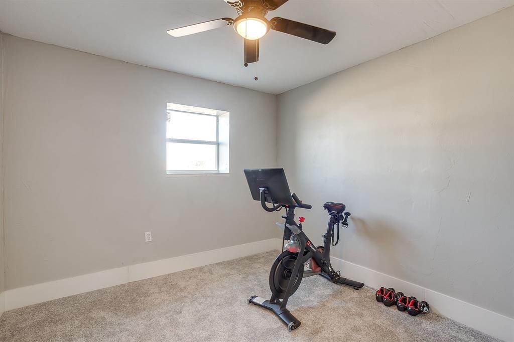 8140 Lavender Road Springtown, TX 76082 - Photo 40 of 40 a view of a room with gym equipment