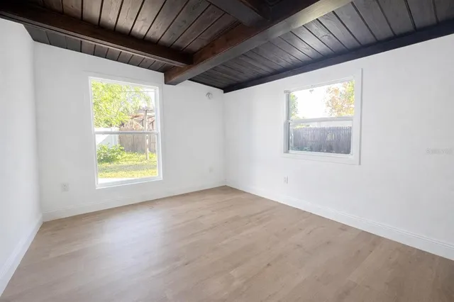 an empty room with windows