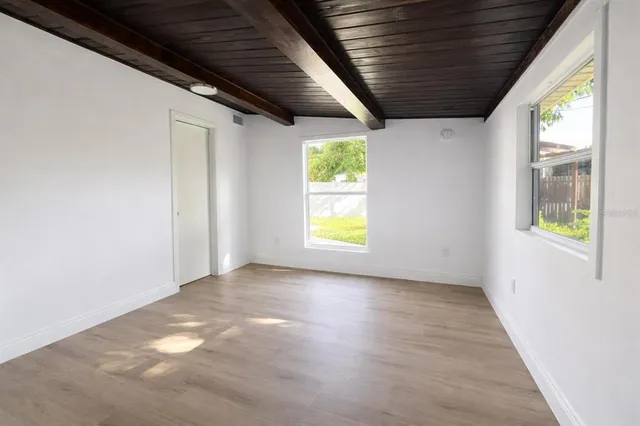 an empty room with windows