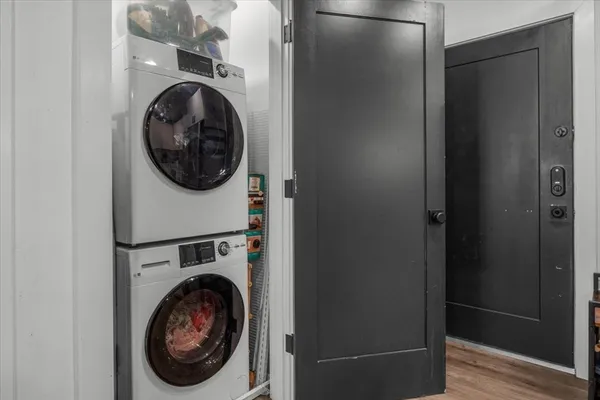 a view of a hallway with washer and dryer