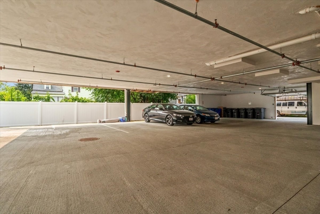 173 Magnolia Street, Unit 5 Boston, MA 02125 - Photo 19 of 23 a view of parking space and parking