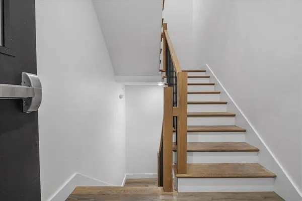 a view of entryway with wooden floor
