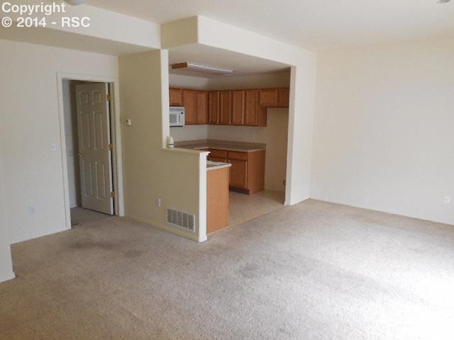 2094 Legacy Ridge View, Unit 111 Colorado Springs, CO 80910 - Photo 2 of 10 Entry Way Looking In.