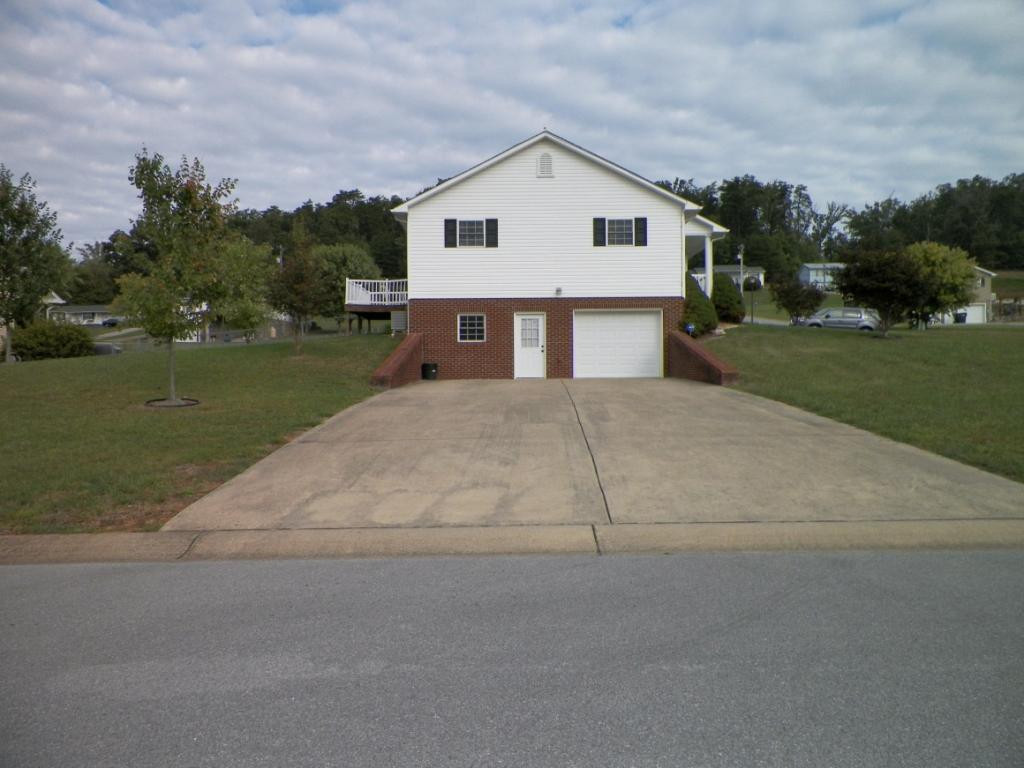 303 Reed Avenue Greeneville, TN 37743 - Photo 35 of 36 Lower garage walkout door