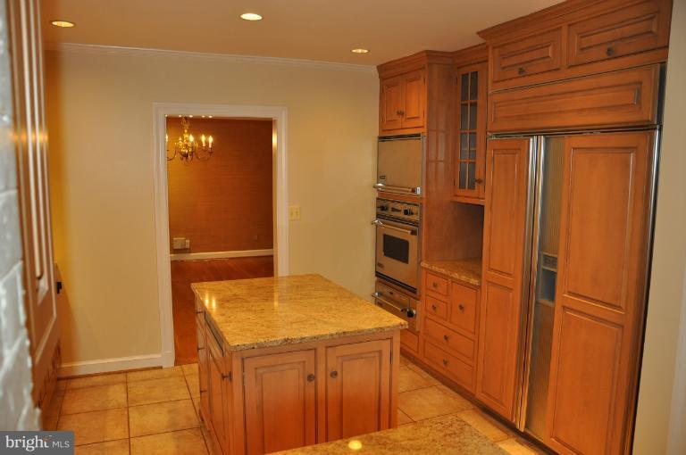 5816 Marbury Road Bethesda, MD 20817 - Photo 16 of 18 a bathroom with a sink and a mirror