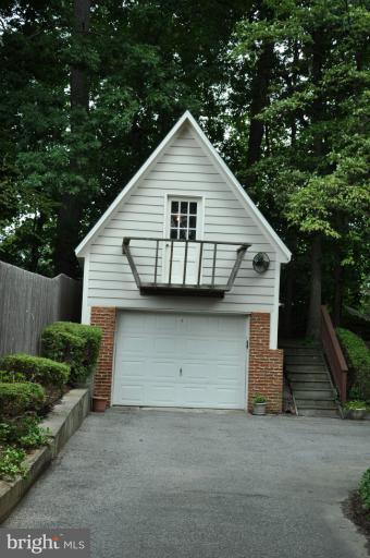 5816 Marbury Road Bethesda, MD 20817 - Photo 17 of 18 a front view of a house with a garage