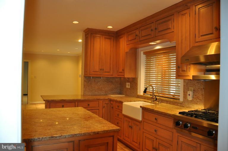 5816 Marbury Road Bethesda, MD 20817 - Photo 6 of 18 a kitchen with a sink and a refrigerator