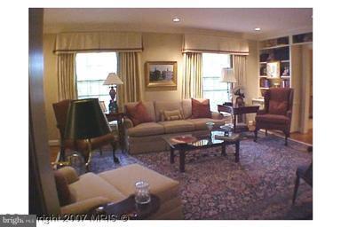5816 Marbury Road Bethesda, MD 20817 - Photo 7 of 18 a living room with furniture and a large window