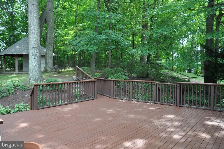 5816 Marbury Road Bethesda, MD 20817 - Photo 8 of 18 a view of balcony with wooden fence