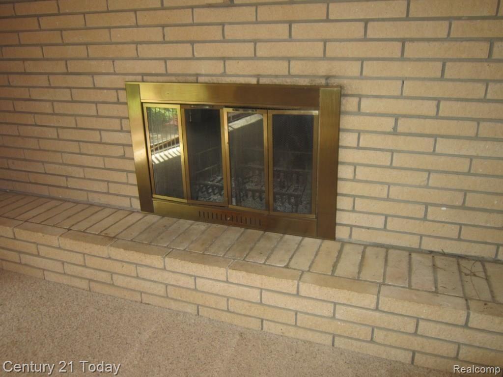 1965 Roxbury Run Wixom, MI 48393 - Photo 26 of 66 fireplace.jpg