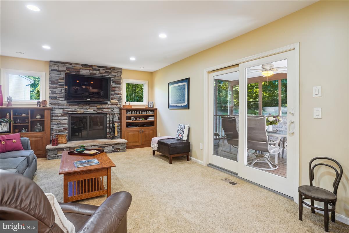 1307 Quail Ridge Drive Reston, VA 20194 - Photo 10 of 67 Gorgeous stone fireplace flanked by windows