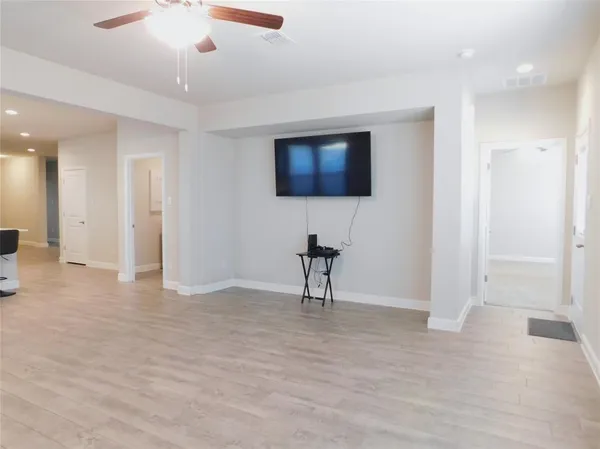 a view of livingroom with a workspace