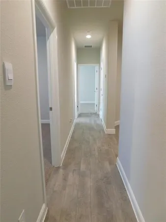 an empty room with closet area