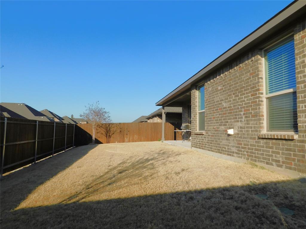 5230 Mountain View Drive Krum, TX 76249 - Photo 26 of 27 a view of backyard of the house