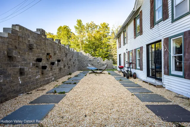 a view of a building with sitting area