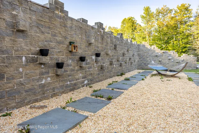 a view of a backyard of the house
