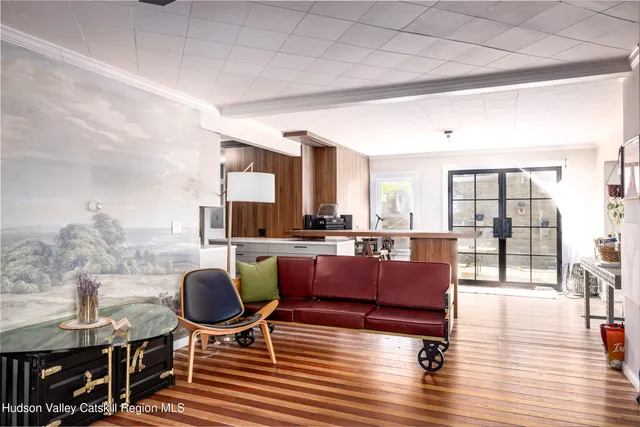 a living room with furniture and a table