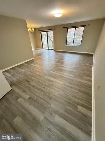 a kitchen with a sink stove and refrigerator