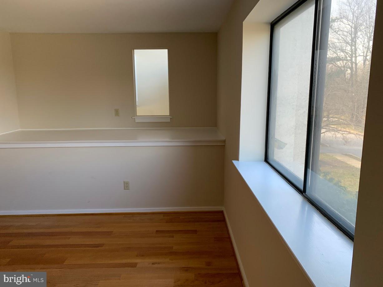 468 Lynetree Drive West Chester, PA 19380 - Photo 19 of 43 a view of balcony with wooden floor