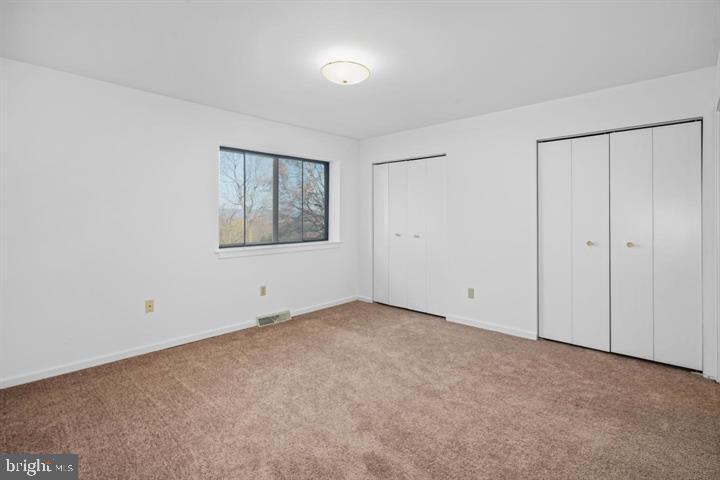 468 Lynetree Drive West Chester, PA 19380 - Photo 26 of 43 an empty room with a empty space and windows