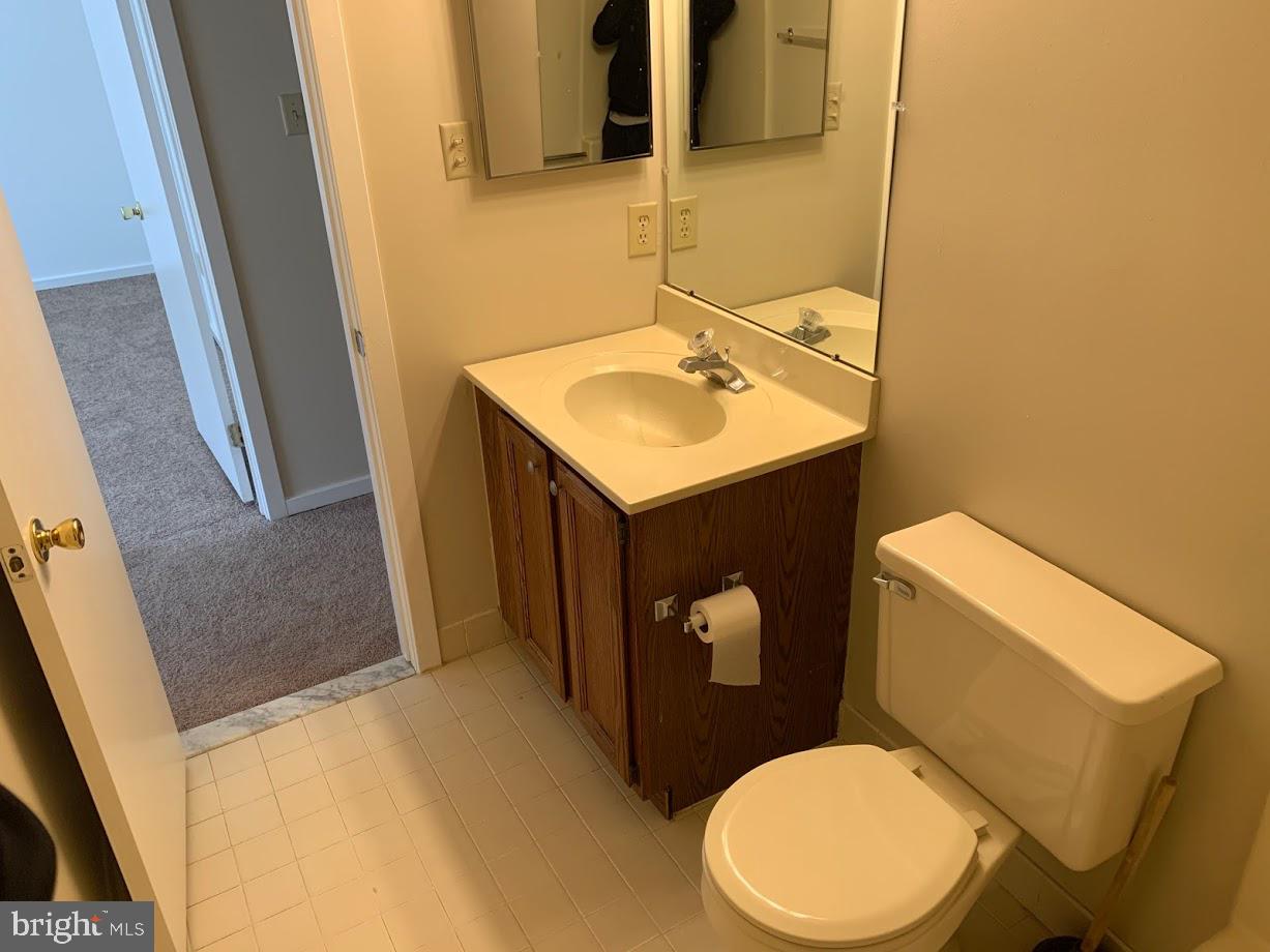 468 Lynetree Drive West Chester, PA 19380 - Photo 29 of 43 a bathroom with a sink and a mirror