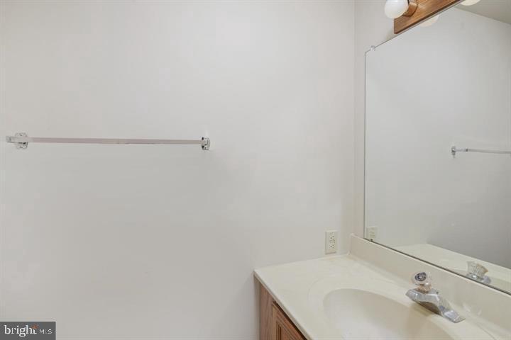 468 Lynetree Drive West Chester, PA 19380 - Photo 4 of 43 a bathroom with a sink and a mirror