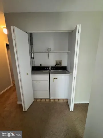 a view of room with gym equipment