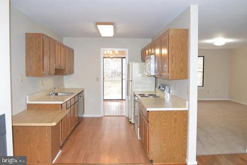 468 Lynetree Drive West Chester, PA 19380 - Photo 9 of 43 a kitchen with a sink stove and refrigerator
