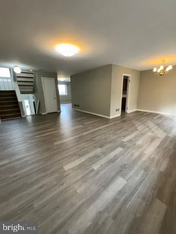 en empty room with windows