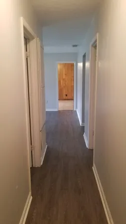 a bathroom with a toilet a sink and bathtub