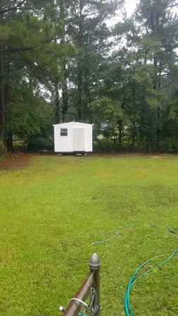 a view of a swimming pool and outdoor space