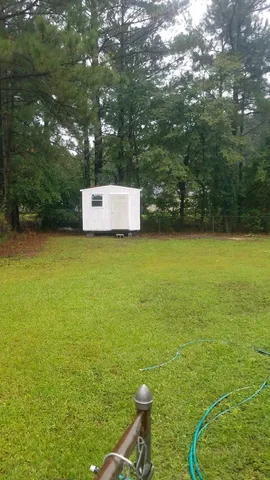 a view of a swimming pool and outdoor space