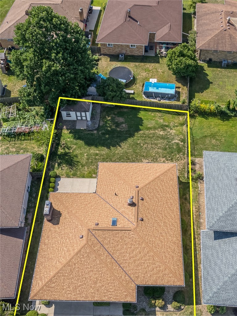 5611 Ralston Drive Parma, OH 44129 - Photo 34 of 39 Aerial perspective of suburban area with property boundaries highlighted