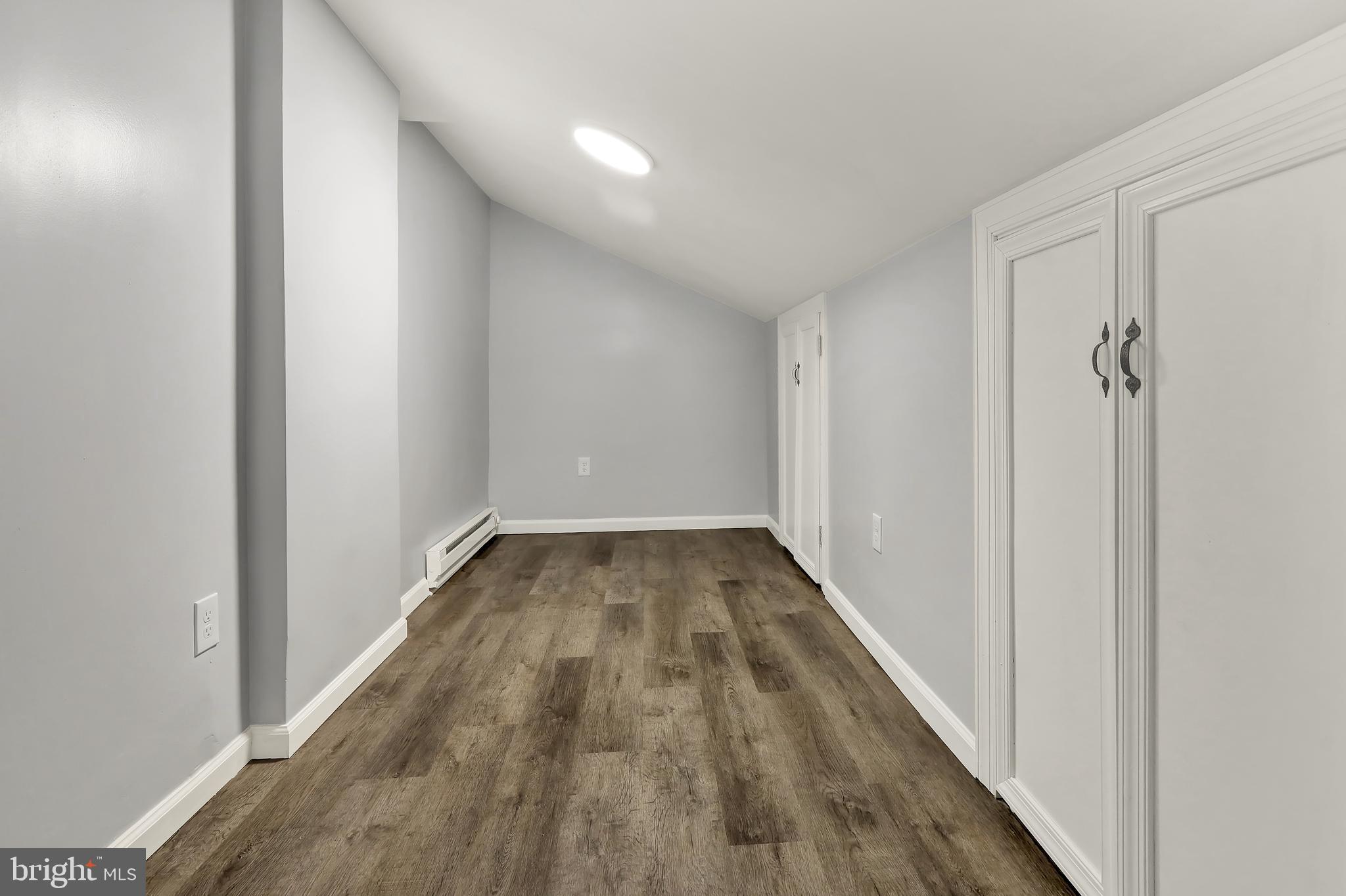 1156 Franklin Street, Unit 3 Reading, PA 19602 - Photo 11 of 11 a view of a hallway with wooden floor