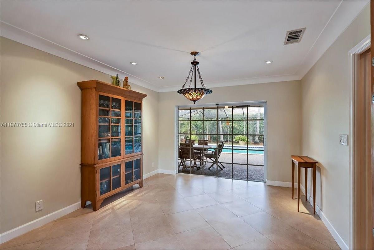 1525 Southwest 6th Avenue Boca Raton, FL 33486 - Photo 13 of 30 an empty room with furniture and large windows