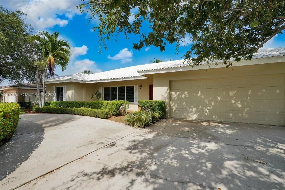 1525 Southwest 6th Avenue Boca Raton, FL 33486 - Photo 2 of 30 a view of a front of house with a yard
