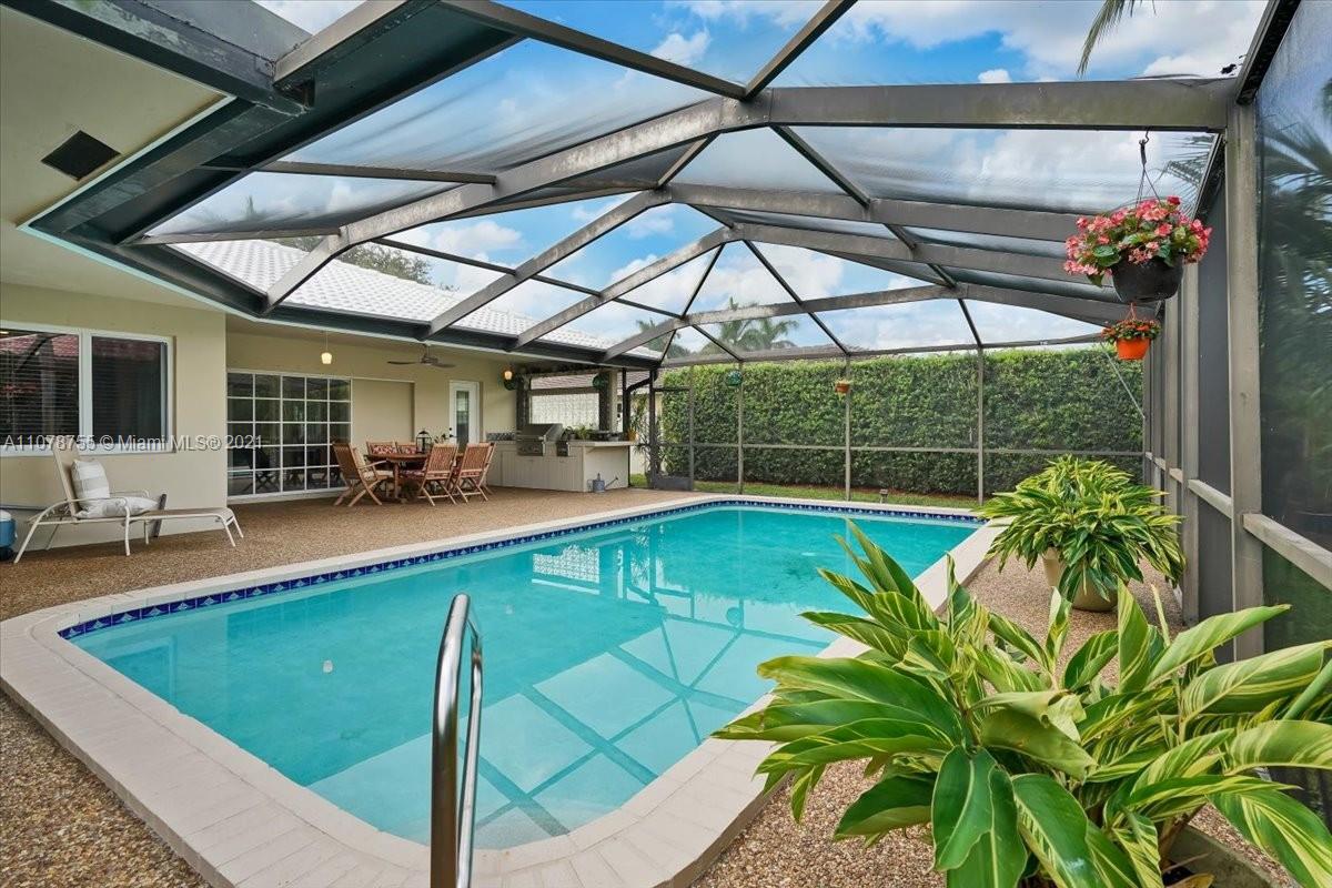 1525 Southwest 6th Avenue Boca Raton, FL 33486 - Photo 29 of 30 a view of a swimming pool with a patio