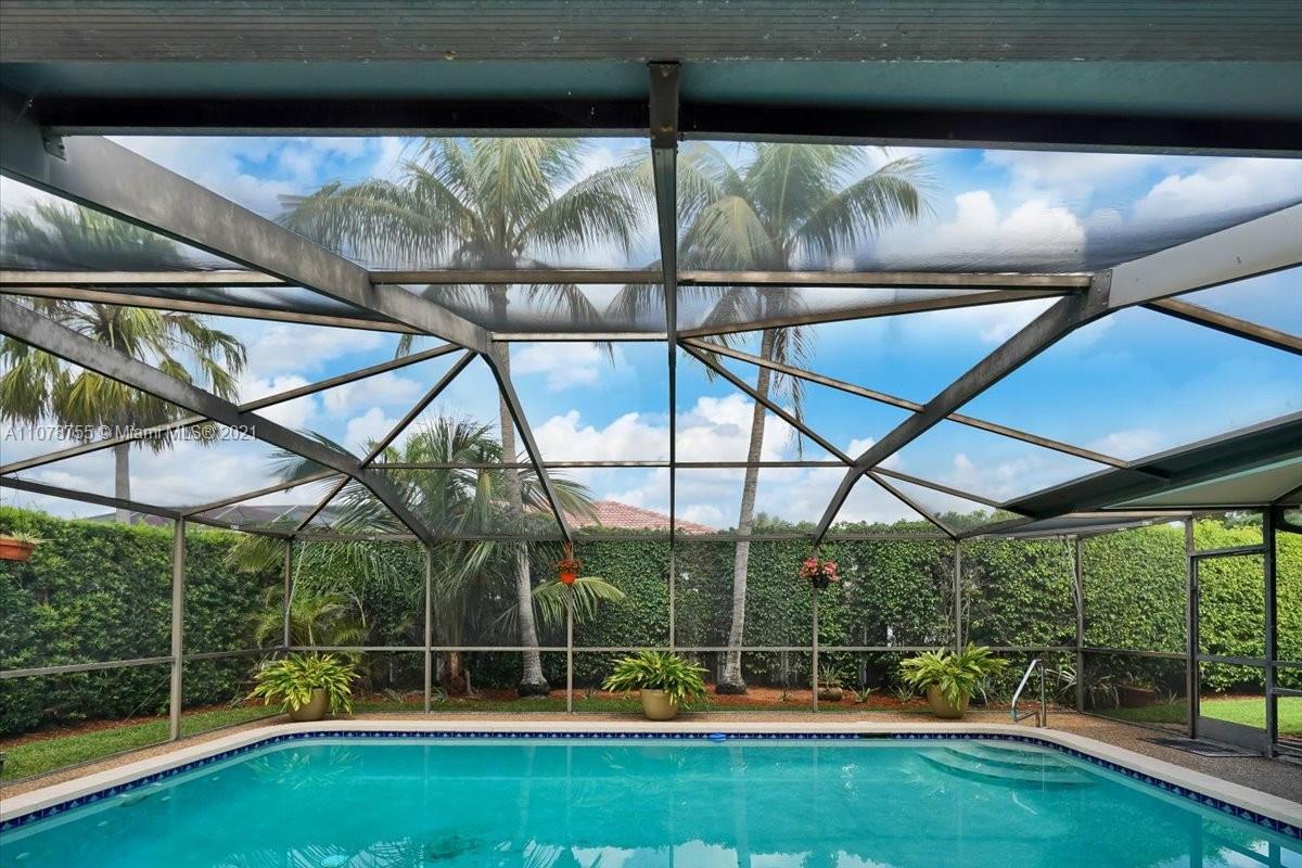 1525 Southwest 6th Avenue Boca Raton, FL 33486 - Photo 30 of 30 a view of outdoor space with swimming pool and outdoor seating