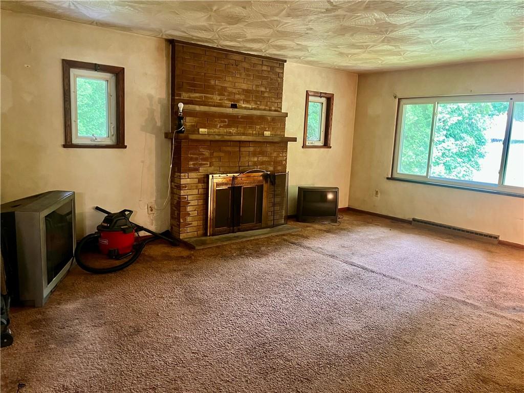 946 Herman Butler, PA 16002 - Photo 13 of 20 a view of a livingroom with furniture and a fireplace