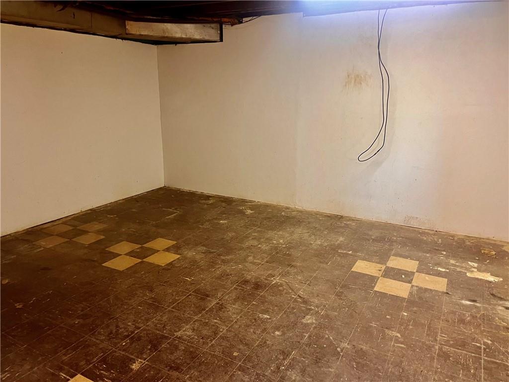 946 Herman Butler, PA 16002 - Photo 14 of 20 a view of a room with racks on the wall