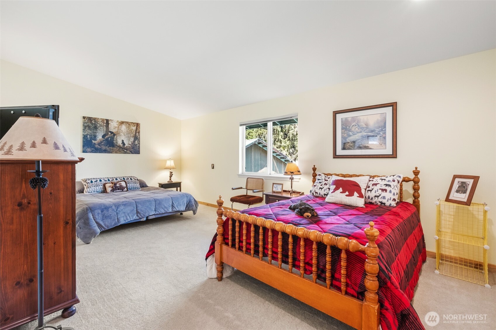 8348 Main Street, Unit 1 Peshastin, WA 98847 - Photo 32 of 40 a bedroom with bed and a window