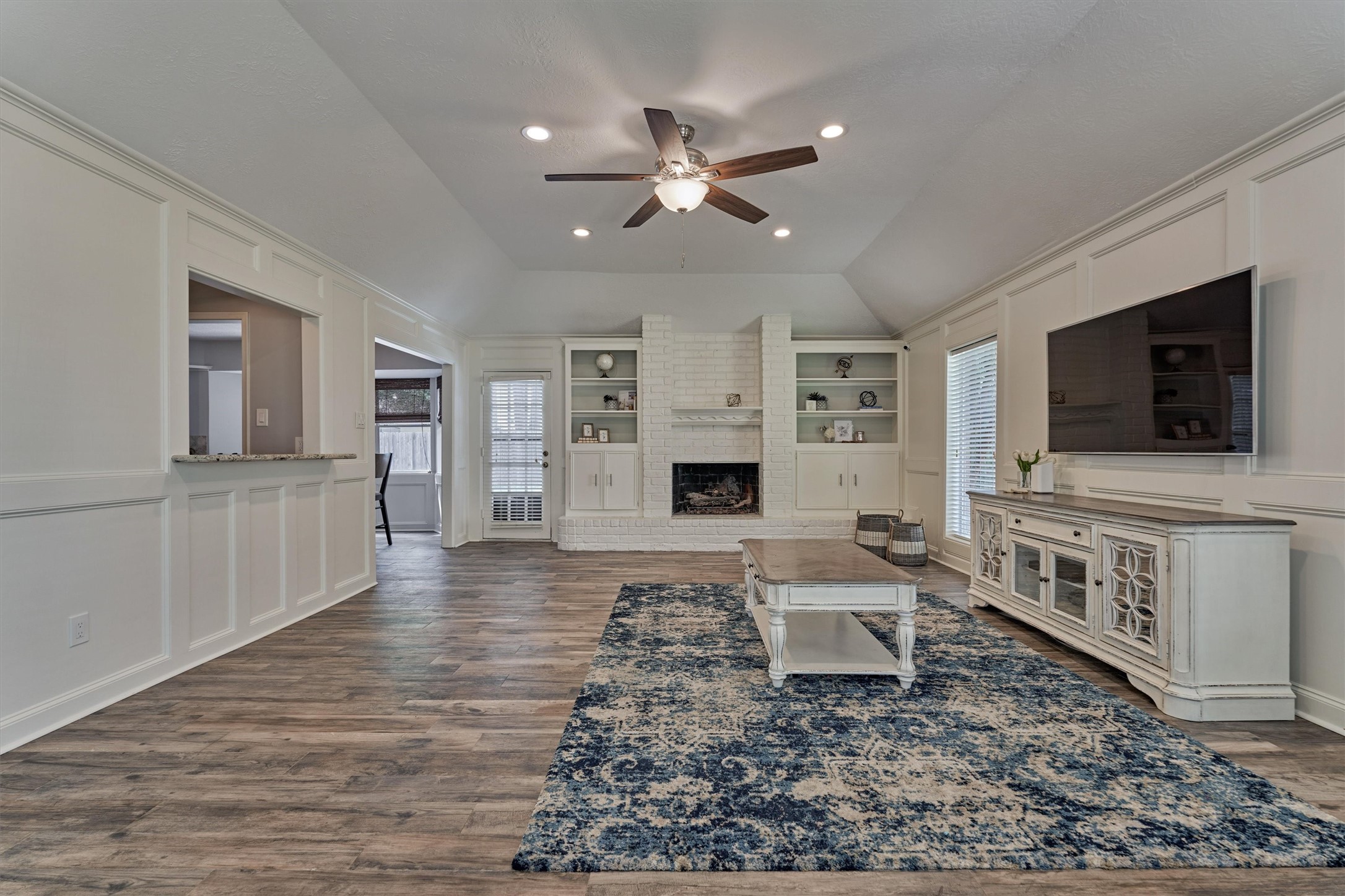 6522 Castle Pine Lane Spring, TX 77379 - Photo 34 of 49 a living room with furniture and a flat screen tv