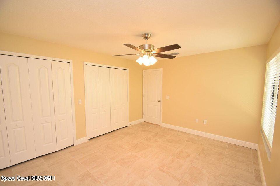 670 Cedar Side Circle Northeast Palm Bay, FL 32905 - Photo 17 of 22 a view of an empty room